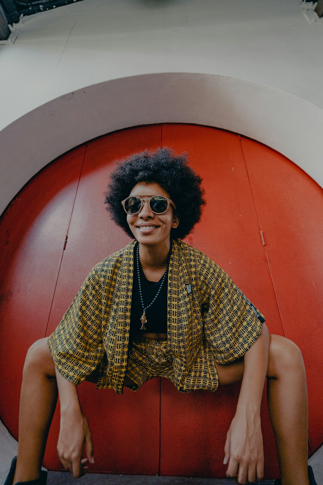 Portrait of a woman in a blazer smiling at the camera